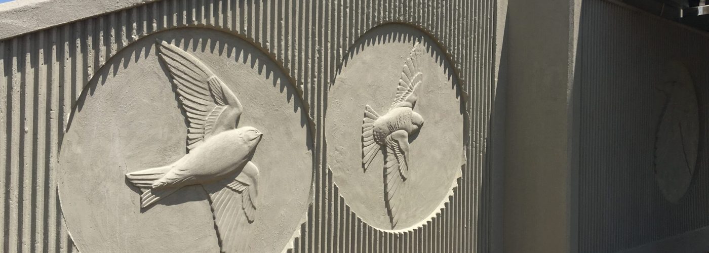 Decorative concrete wall panels at Seven Islands State Birding Park