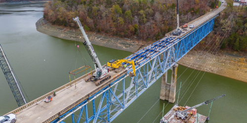 Fishing Creek bridge construction with crane and river work platform